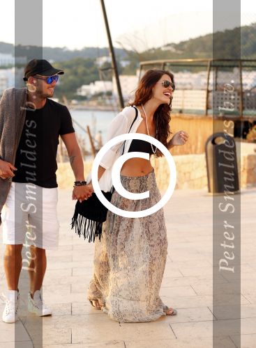 Ibiza 10 juli 2012
Wesley Sneijder en zijn vrouw Yolanthe Sneijder Cabau verliefd op ibiza genieten van de ondergaande zon.
Peter Smulders bv