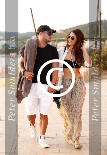 Ibiza 10 juli 2012
Wesley Sneijder en zijn vrouw Yolanthe Sneijder Cabau verliefd op ibiza genieten van de ondergaande zon.
Peter Smulders bv