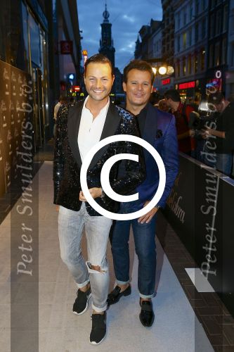 AMSTERDAM - Bij het Tuschinski Theater is de premiere van Behind the Candelabra. Met op de rode loper  Fred v Leer en Leco v Zadelhoff