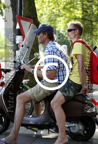 Amsterdam 22 juli 2013
Gijs Staverman met een vriend op zijn vespa scooter.
Peter Smulders bv