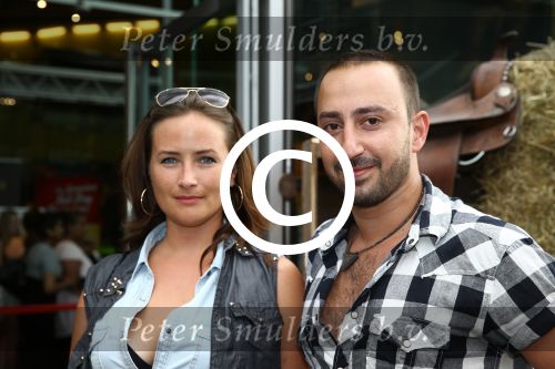 Amsterdam, 5 Augustus 2013
Premiere de Lone Ranger
Gurkan Kucuksenturk met partner
Foto Peter Smulders BV