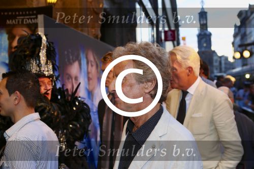 AMSTERDAM - Bij het Tuschinski Theater is de premiere van Behind the Candelabra. Met op de rode loper  Hans v Willigenburg.