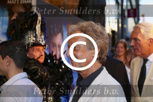 AMSTERDAM - Bij het Tuschinski Theater is de premiere van Behind the Candelabra. Met op de rode loper  Hans v Willigenburg.