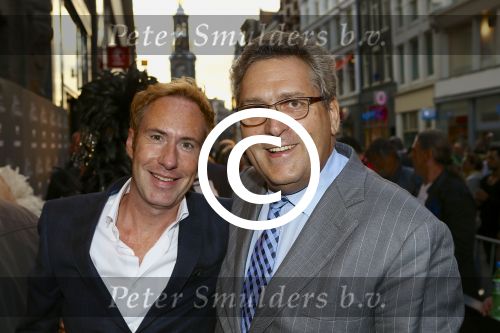 AMSTERDAM - Bij het Tuschinski Theater is de premiere van Behind the Candelabra. Met op de rode loper  Henk Krol en zijn partner Reon Nettenbreijers.