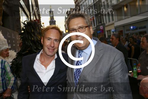 AMSTERDAM - Bij het Tuschinski Theater is de premiere van Behind the Candelabra. Met op de rode loper  Henk Krol en zijn partner Reon Nettenbreijers.