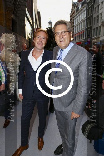 AMSTERDAM - Bij het Tuschinski Theater is de premiere van Behind the Candelabra. Met op de rode loper  Henk Krol en zijn partner Reon Nettenbreijers.