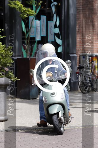 Amsterdam 25 juni 2013
Huub Stapel op zijn vespa scooter
Peter Smulders bv