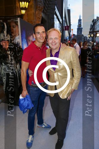 AMSTERDAM - Bij het Tuschinski Theater is de premiere van Behind the Candelabra. Met op de rode loper  Marcel van den Eng met Frits Huffnagel.
