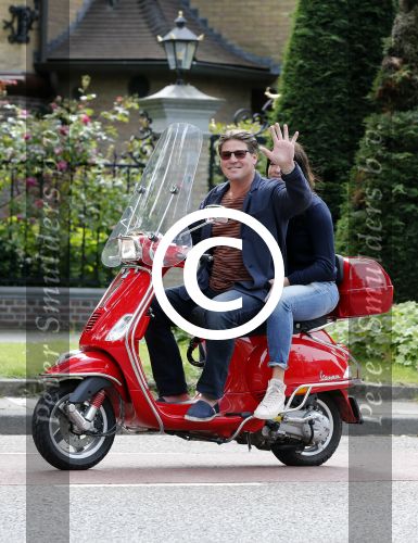 Amsterdam 26 juni 2013
Martijn en Amanda Krabbe op hun vespa scooter.
Peter Smulders bv