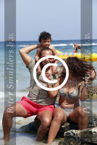 ibiza 14 juli 2013
Najib Amhali met zijn vrouw Niama en zoon Noah op coco beach .
Ze zaten daar met vrienden en familie.
Peter Smulders bv