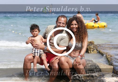 ibiza 14 juli 2013
Najib Amhali met zijn vrouw Niama en zoon Noah op coco beach .
Ze zaten daar met vrienden en familie.
Peter Smulders bv