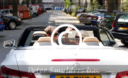 Amsterdam 23 juli 2013
Patricia Paay en Nicky v dam in hun mercedes cabrio.
Peter Smulders bv