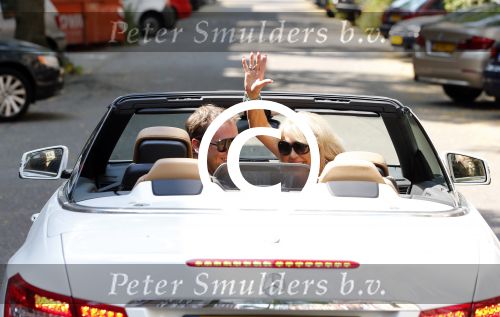 Amsterdam 23 juli 2013
Patricia Paay en Nicky v dam in hun mercedes cabrio.
Peter Smulders bv