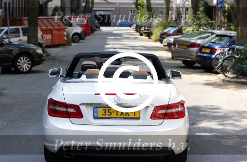 Amsterdam 23 juli 2013
Patricia Paay en Nicky v dam in hun mercedes cabrio.
Peter Smulders bv