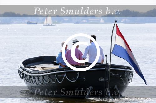 Loosdrecht 22 juli 2013
Ronnie Tober en Jan Jochems op boot varen op de vecht.
Peter Smulders bv