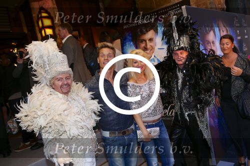 AMSTERDAM - Bij het Tuschinski Theater is de premiere van Behind the Candelabra. Met op de rode loper  Winston Post is met partner Denise van Rijswijk.