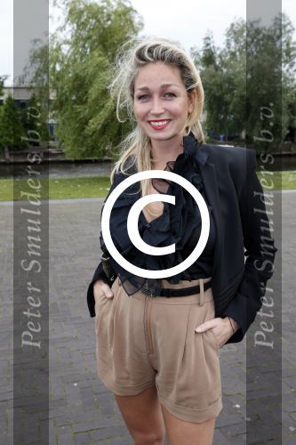 Amsterdam 26 juni 2013
Jackie\'s best dressed in the oyster club bij het olympisch stadion. Zangeres Do Dominique Verhulst met haar beste vriendin
Peter Smulders bv