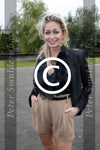 Amsterdam 26 juni 2013
Jackie\'s best dressed in the oyster club bij het olympisch stadion. Zangeres Do Dominique Verhulst met haar beste vriendin
Peter Smulders bv