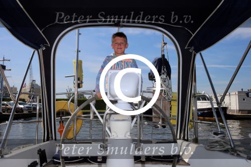 Sneek, 2 Augustus 2015
Rintje Ritsma met zijn vriendin Youandi Mazeland en haar zoon Clemens
met hun boot de Bluefin