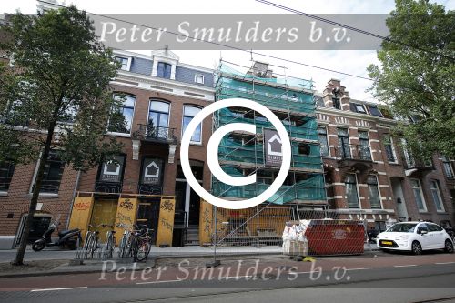Amsterdam 8 juli 2015  
Johnny Heitinga en Charlotte en slager Evert Blauendraat in amsterdam zuid