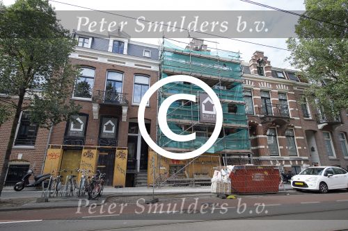 Amsterdam 8 juli 2015  
Johnny Heitinga en Charlotte en slager Evert Blauendraat in amsterdam zuid