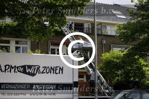 Amsterdam 18 juli 2015
Verhuizers halen spullen uit het huis van Martijn Krabbe.