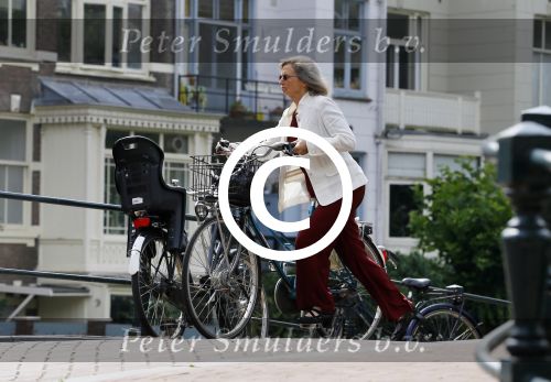 Amsterdam 10 augustus 2015     
Wim en Rita Kok op de fiets in Amsterdam.