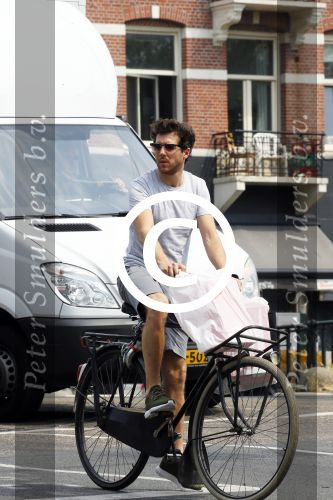 Amsterdam 2 juli 2015 
 William Spaaij op de fiets