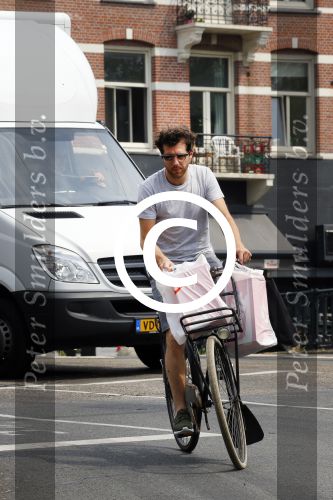 Amsterdam 2 juli 2015 
 William Spaaij op de fiets