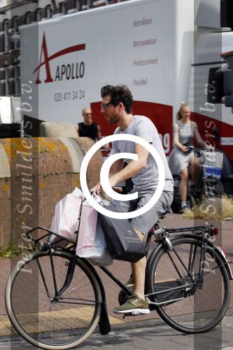 Amsterdam 2 juli 2015 
 William Spaaij op de fiets