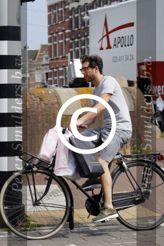 Amsterdam 2 juli 2015 
 William Spaaij op de fiets