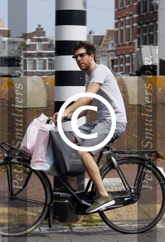 Amsterdam 2 juli 2015 
 William Spaaij op de fiets
