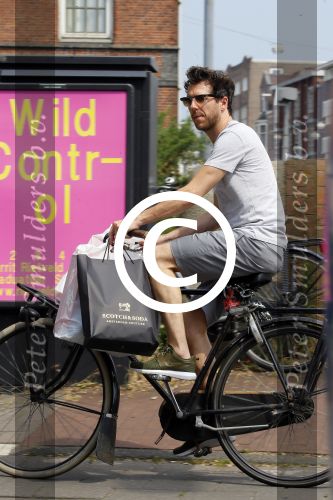 Amsterdam 2 juli 2015 
 William Spaaij op de fiets