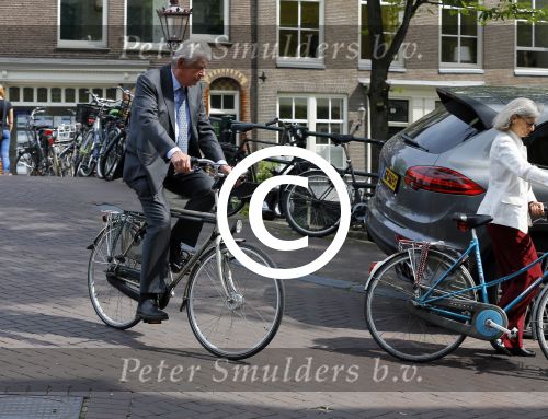 Amsterdam 10 augustus 2015     
Wim en Rita Kok op de fiets in Amsterdam.