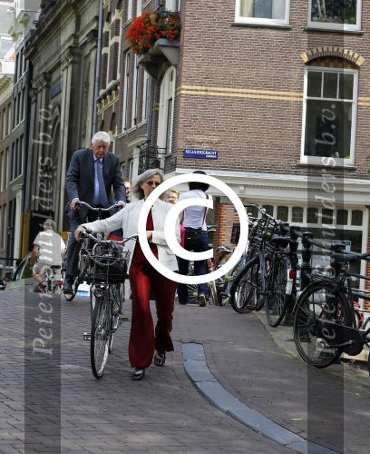 Amsterdam 10 augustus 2015     
Wim en Rita Kok op de fiets in Amsterdam.