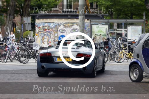 Amsterdam 26 juni 2015  
Winnie Haatrecht ( Voetbalmakelaar) in zijn audi RS8 cabrio