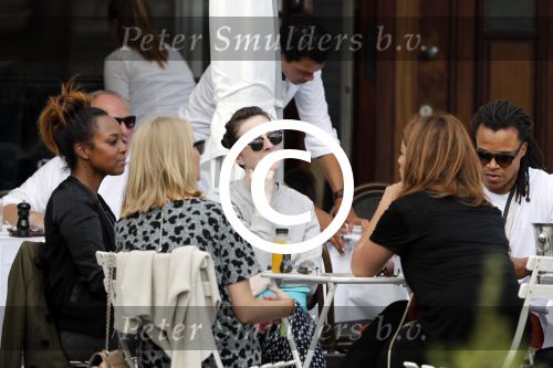 Amsterdam 17 juli 2016 
Edgar davids op terras met verschillende dames.