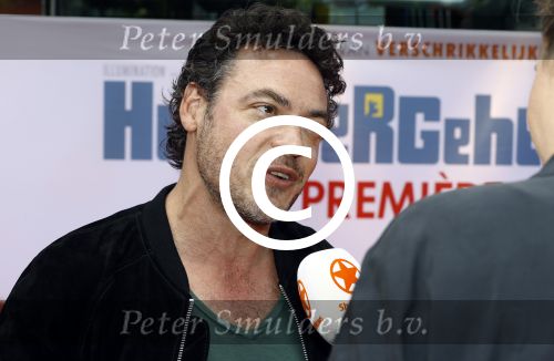 Amsterdam 17 juli 2016
Premiere huisdiergeheimen in Pathe arena. Fedja v Huet met zijn vrouw Karina Smulders