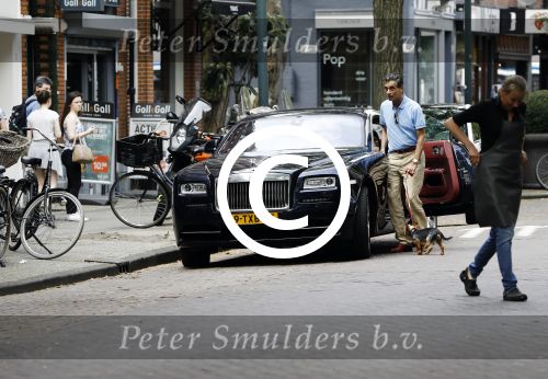 Amsterdam 23 juli 2016 
Advocaat Gerard Spong met zijn Rolls Royce en zijn hondje