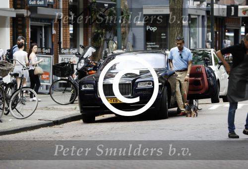 Amsterdam 23 juli 2016 
Advocaat Gerard Spong met zijn Rolls Royce en zijn hondje