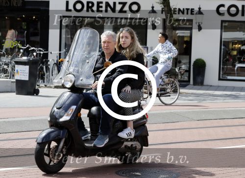 Amsterdam 6 juli 2016 
Hajo Bruins met ik denk zijn oudste dochter op de scooter