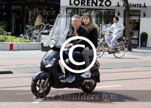 Amsterdam 6 juli 2016 
Hajo Bruins met ik denk zijn oudste dochter op de scooter