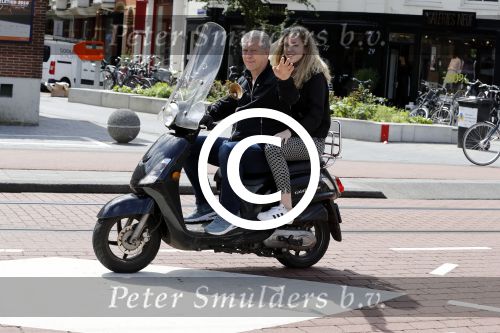 Amsterdam 6 juli 2016 
Hajo Bruins met ik denk zijn oudste dochter op de scooter