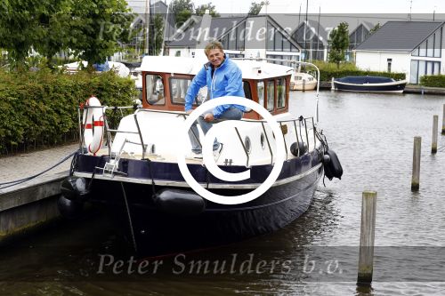 Uitgeest 11 juli 2016
Henny Huisman op zijn boot.