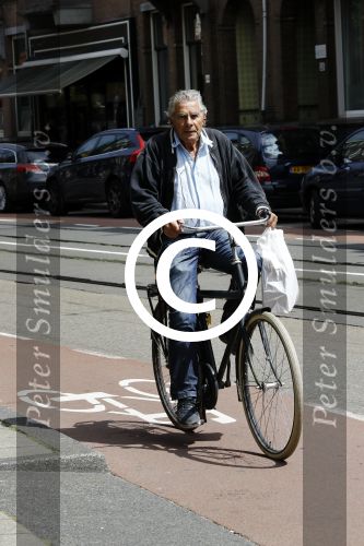 Amsterdam 12 juli 2016  
Jan Stekelenburg op de fiets in Amsterdam.