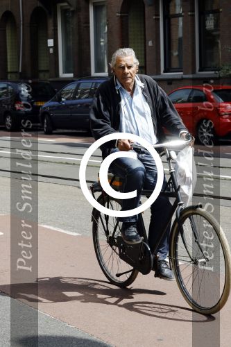 Amsterdam 12 juli 2016  
Jan Stekelenburg op de fiets in Amsterdam.