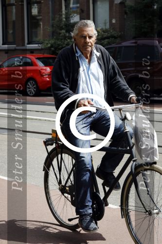 Amsterdam 12 juli 2016  
Jan Stekelenburg op de fiets in Amsterdam.