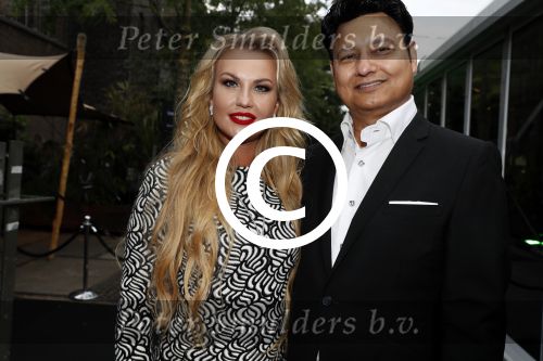 Amsterdam 8 juli 2016
Modeshow Tony Cohen tijdens de amsterdam fashion week op westergasfabriekterrein. Kamaliya Zahoor met haar man