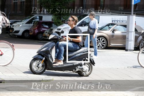 Amsterdam 19 juli 2018
Bas Smit op zijn scooter.