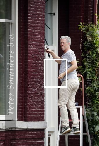 Amsterdam 12 juli 2018
Hajo Bruins aan het klussen bij zijn huis.